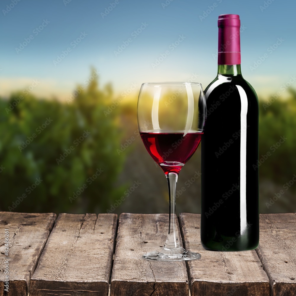 Wine Bottle. Red wine bottle and glass, isolated on white