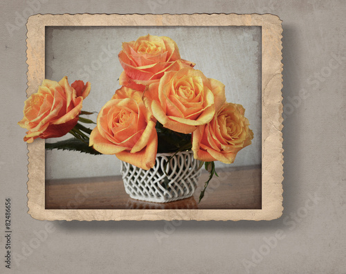 bouquet of roses in fotoframe, with retro vintage style effect a photo