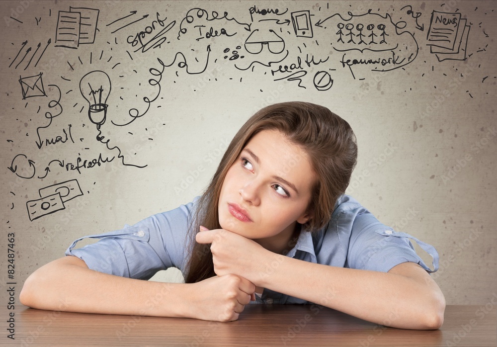 Fototapeta premium Maze. Thinking. Girl solving a problem.