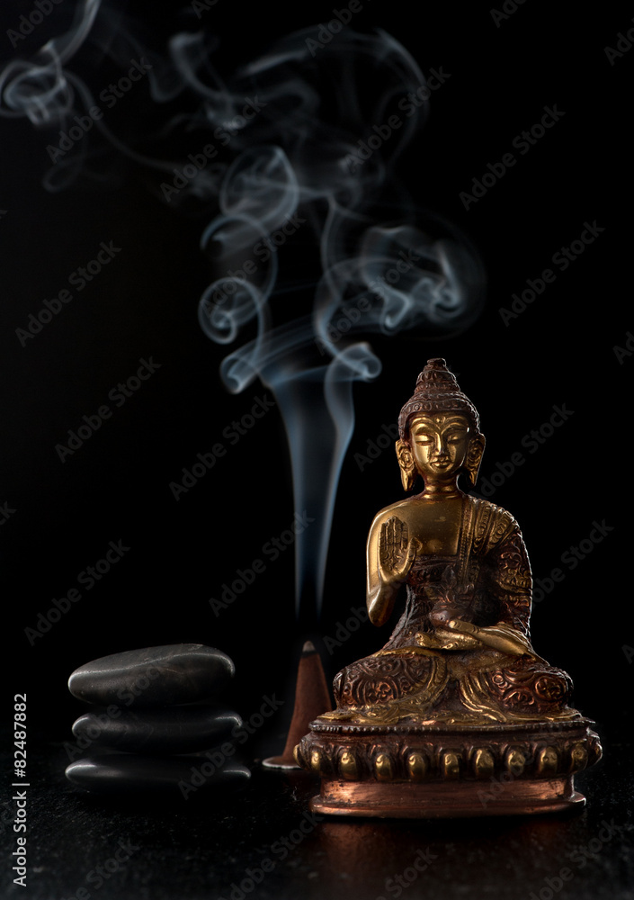 Buddha statue and stones zen. Spa and meditation concept Buddha statue and stones zen. Spa and meditation concept