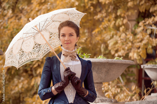 Romantic young beautiful lady outdoors