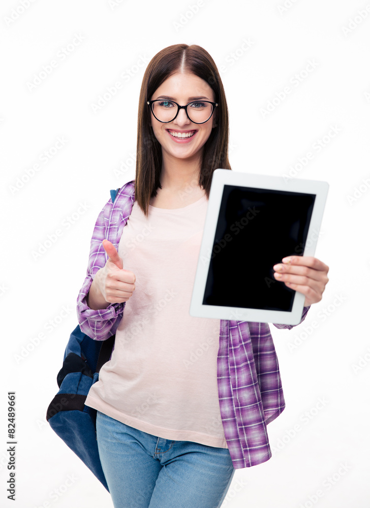 Woman showing tablet computer screen and thumb up Woman showing tablet computer screen and thumb up