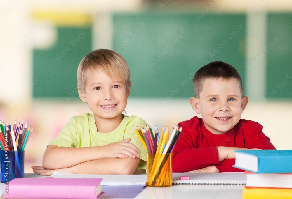 Child. Portrait of two diligent girls looking at camera at Child. Portrait of two diligent girls looking at camera at
