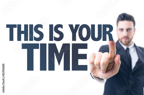 Business man pointing the text: This is Your Time