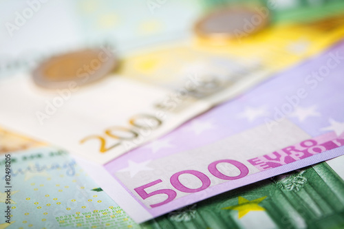 Closeup of euro banknotes and coins