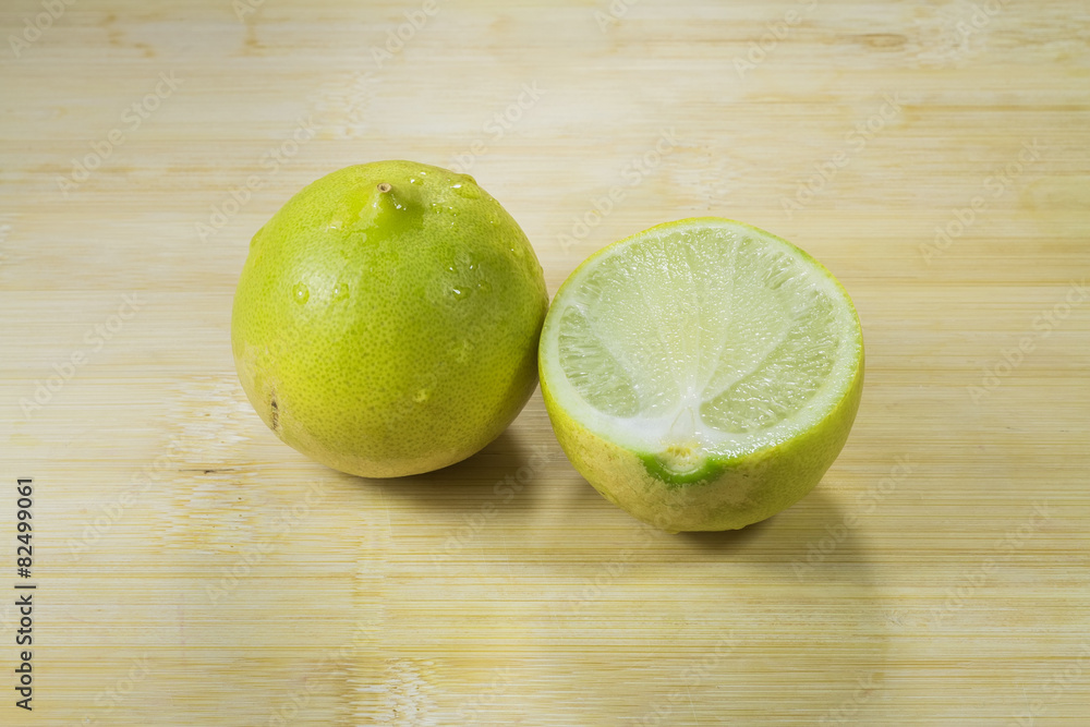 Fresh limes on wooden background Fresh limes on wooden background