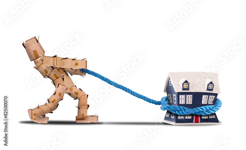 Box character pulling a house with rope isolated