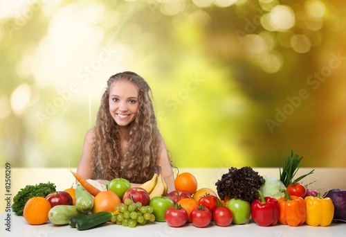 Healthy Eating. Excited woman with fruits and vegetables