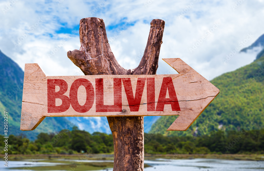 Bolivia wooden sign with mountains background
