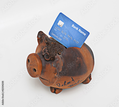 piggy bank with bank card