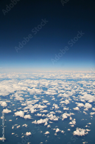view from aeroplane on white clouds