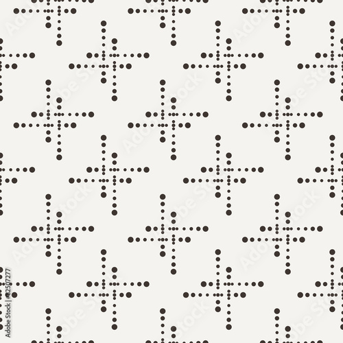 Vector seamless geometric pattern of dots of different sizes