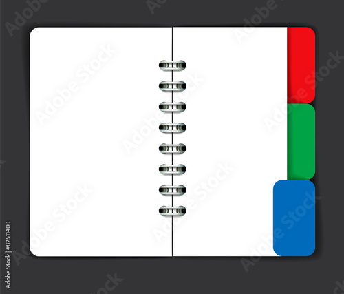Opened note pad with blank spread