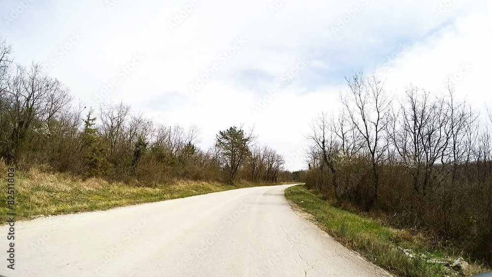 Fast Car driving through a country road in Istria, Croatia Fast Car driving through a country road in Istria, Croatia