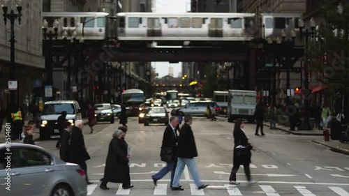 MS Busy street intersection and Chicago Transit Authority elevated train in the Loop, Chicago, Illinois, USA photo