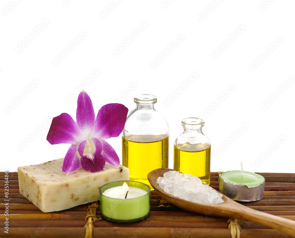 Pink orchid flower and candle ,massage oil Pink orchid flower and candle ,massage oil