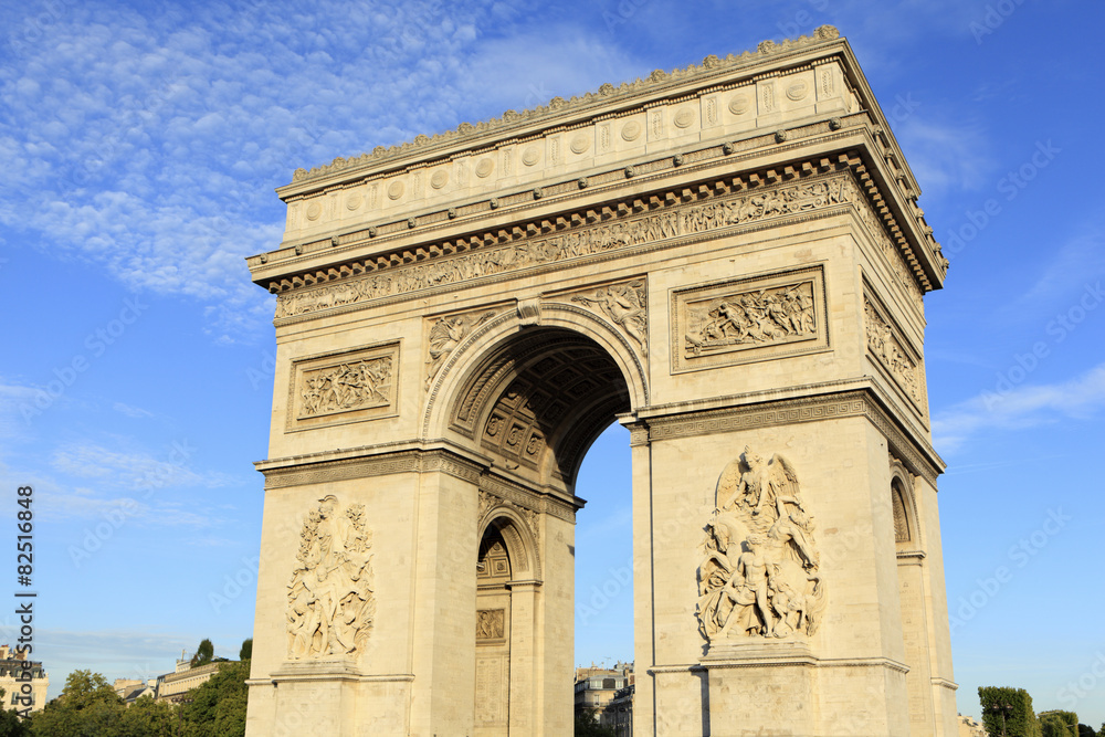 Arc de Triomphe paris france famous landmark monument side view blue sky background photo