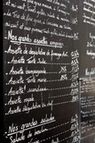 Restaurant chalk board menu in Paris france vertical