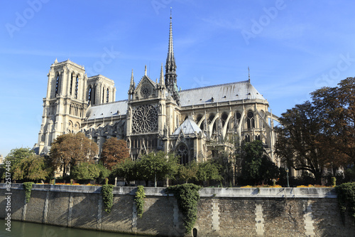 Notre Dame cathedral Paris France side view scene from River Seine with rose window photo
