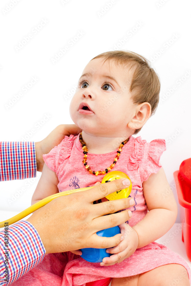 Baby beim Kinderarzt - Stethoskop Baby beim Kinderarzt - Stethoskop