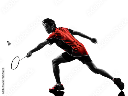 badminton player young man silhouette © snaptitude