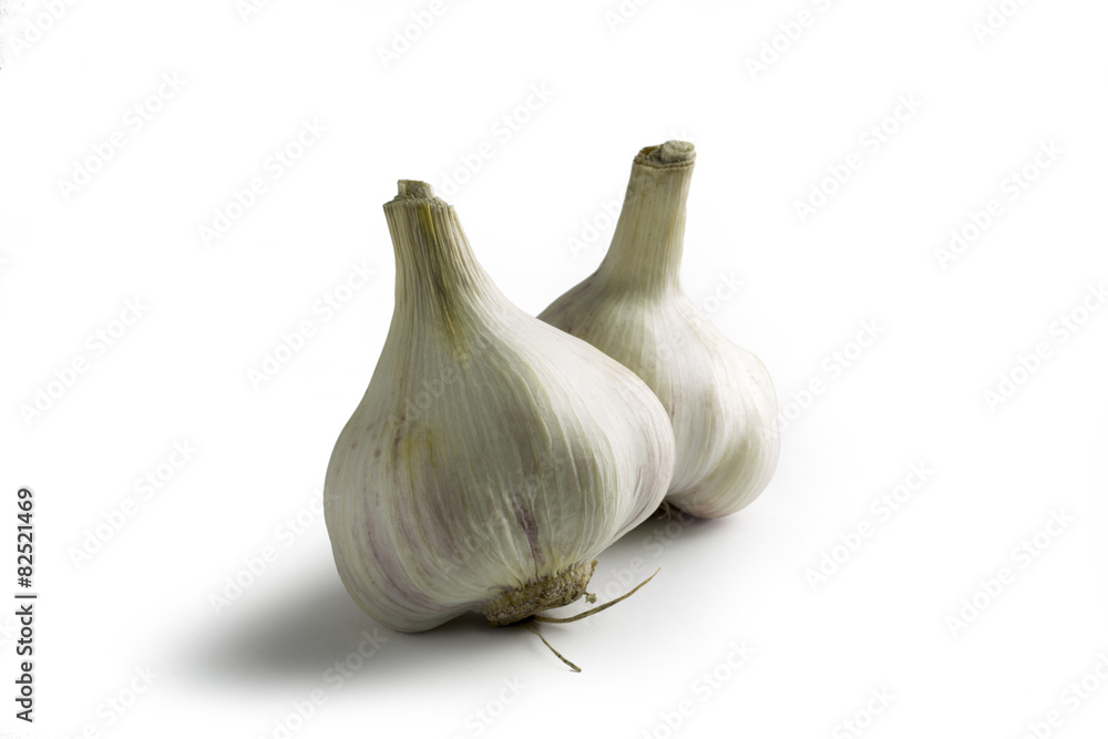 Obraz premium Garlic over a white background