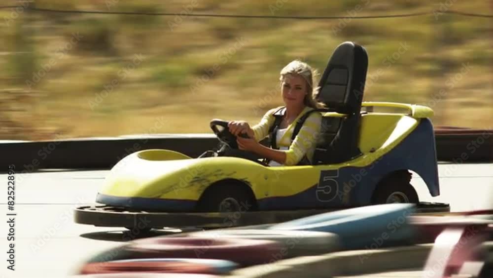 WS TS Young woman riding go-cart, Orem, Utah, USA WS TS Young woman riding go-cart, Orem, Utah, USA