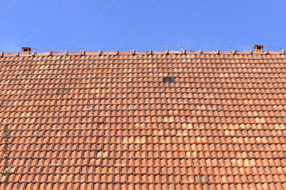 old roof of orange clay tiles