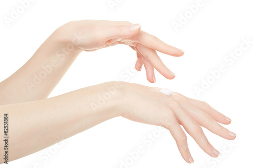Female hands with cream isolated on white, clipping path