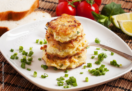 Homemade chicken cutlets sprinkled with green onion, selective f