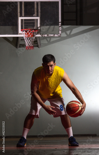 Basketball player carry ball to game competition
