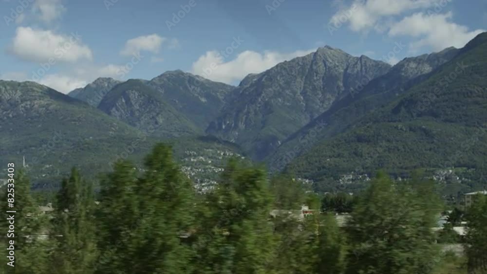 Tracking shot through Italian countryside with mountains in background / , Italy Tracking shot through Italian countryside with mountains in background / , Italy