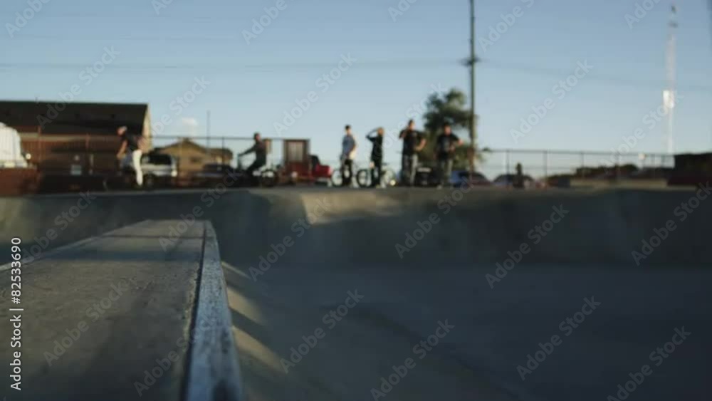 MS Skateboarder sliding ramp in skatepark / Orem, Utah, USA MS Skateboarder sliding ramp in skatepark / Orem, Utah, USA