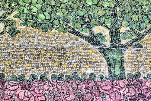 detail of an ancient mosaic  tree and rose garden of an unknown