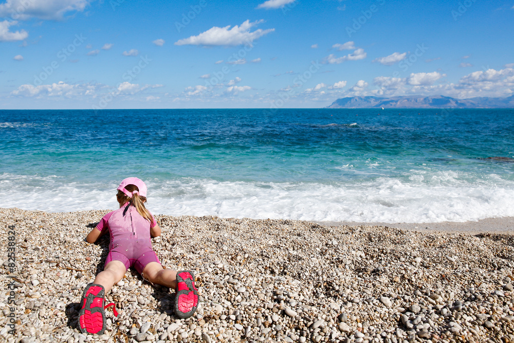 Girl enjoying free time on the beach