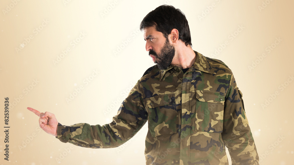 Soldier shouting over white background Soldier shouting over white background