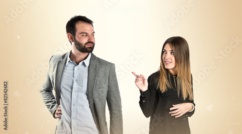 Men seducing a girl over white background