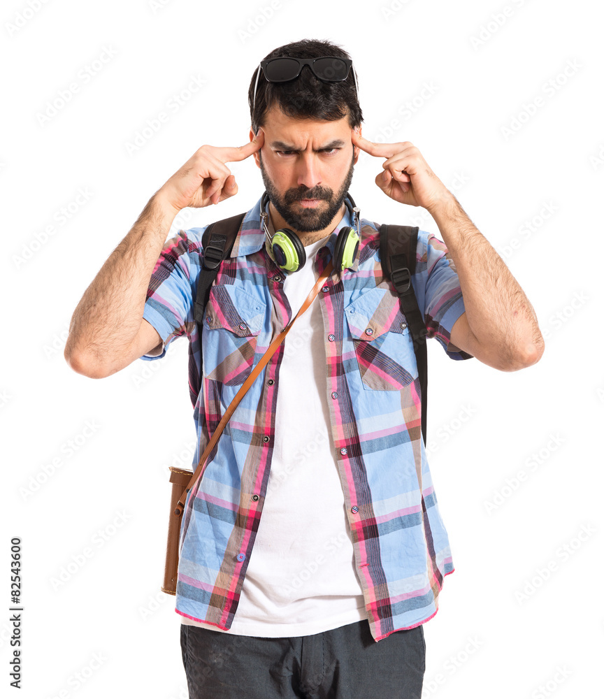 Tourist thinking over white background Tourist thinking over white background