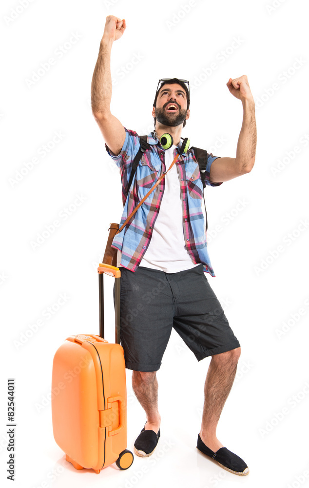Lucky tourist over white background Lucky tourist over white background