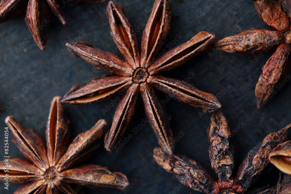 Star anise seeds on dark background. Top view Star anise seeds on dark background. Top view