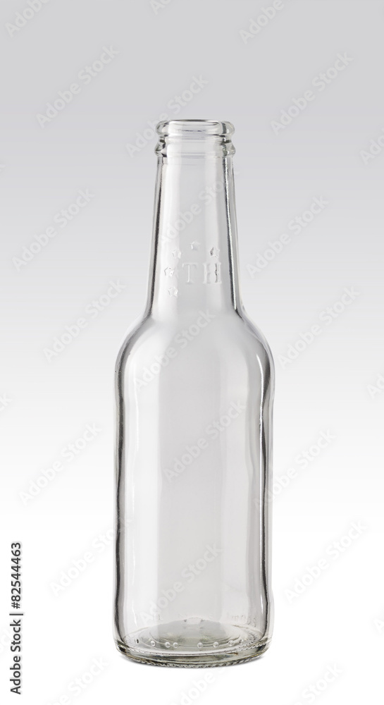 Empty transparent beer bottle