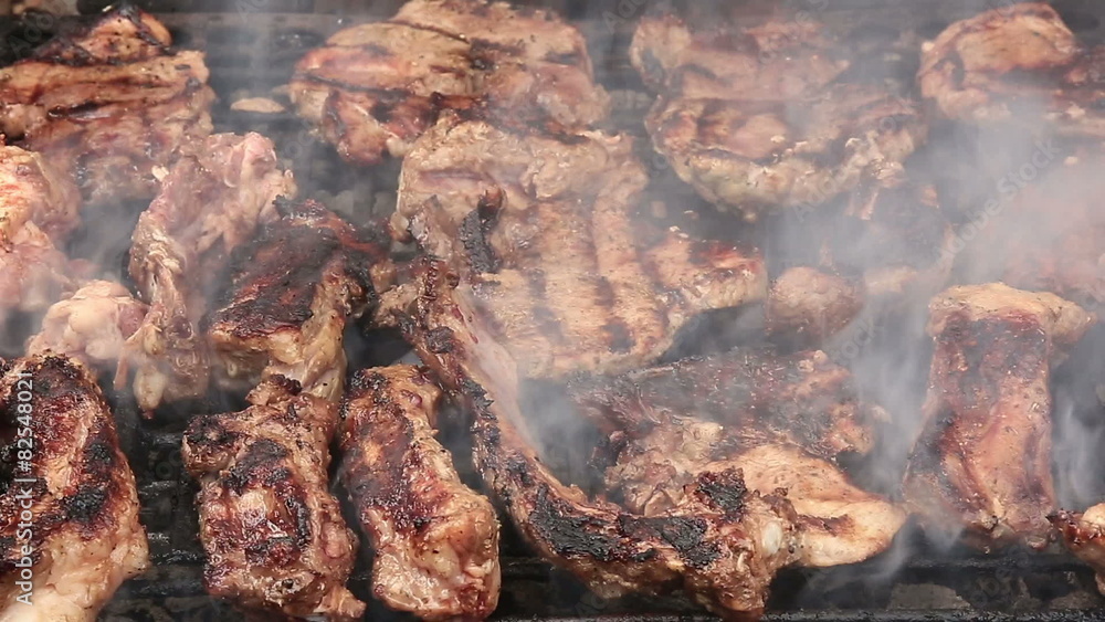 Ribs and steaks on barbeque grill Ribs and steaks on barbeque grill