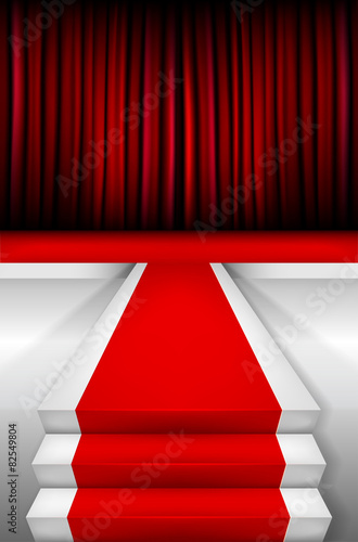 Red carpet on stairways and podium with curtain