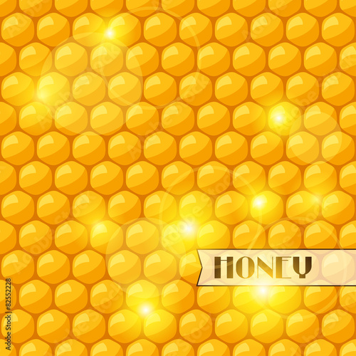 Abstract background with bee honeycombs and honey