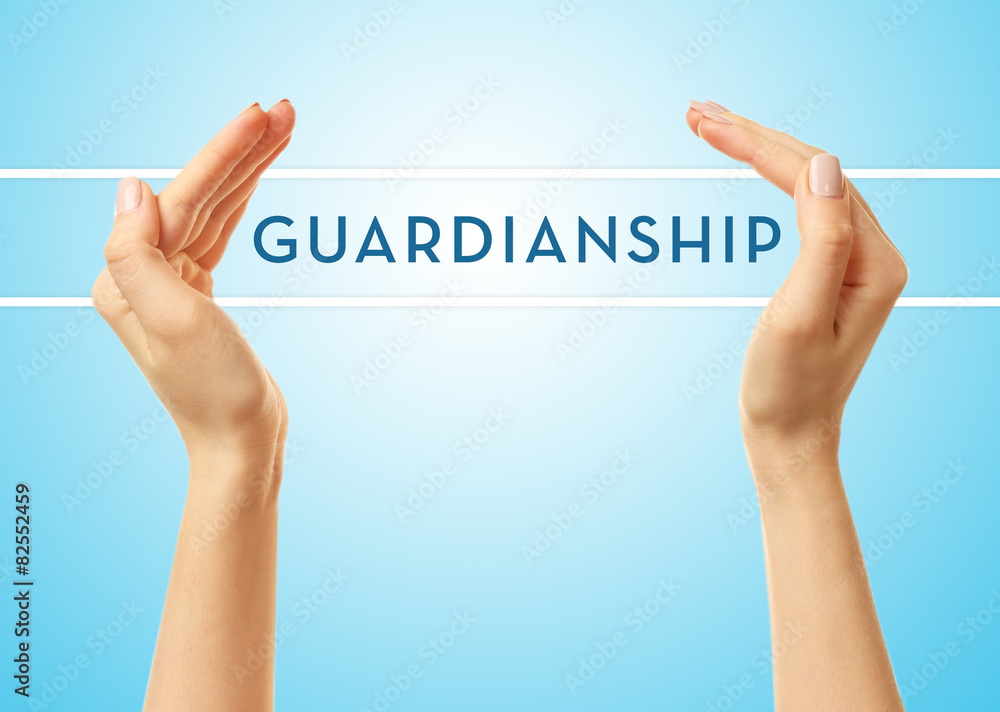 Female hands with word guardianship on blue background Female hands with word guardianship on blue background