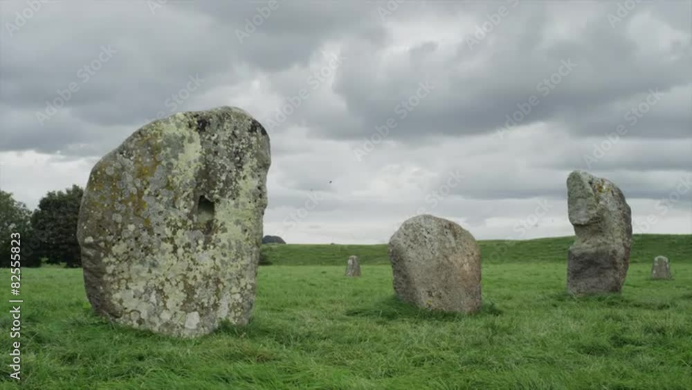 Medium shot of ancient stones in formation / Avebury, England, United Kingdom Medium shot of ancient stones in formation / Avebury, England, United Kingdom