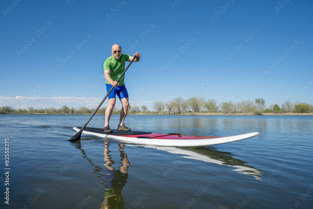Foto stand up paddleboard workout