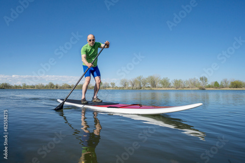 Foto stand up paddleboard workout