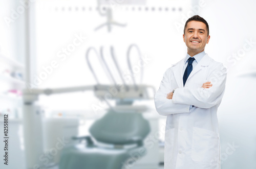 smiling male middle aged dentist photo