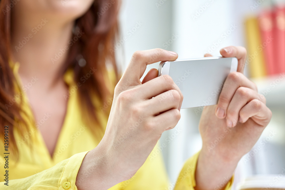 close up of female hands with smartphone at home close up of female hands with smartphone at home